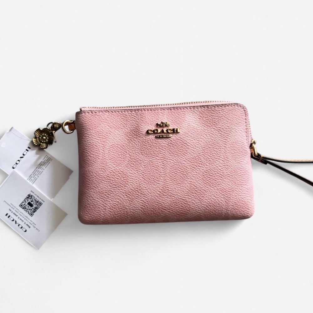 Coach Powder Pink signature zippered wristlet wallet